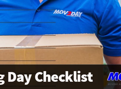 Mover carrying a box - Moving Day Checklist blog from Mov2Day Naples, FL